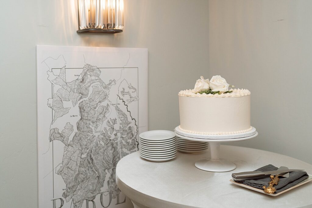 wedding cake. lake tahoe elopement. Reception dinner at Jimmy's in the Landing. lake tahoe wedding elopement photographer videographer. 4JOY media