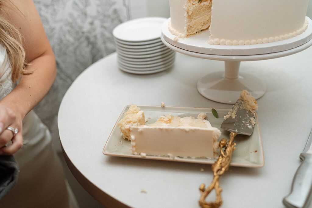 bride and groom cutting the cake. lake tahoe elopement. Reception dinner at Jimmy's in the Landing. lake tahoe wedding elopement photographer videographer. 4JOY media