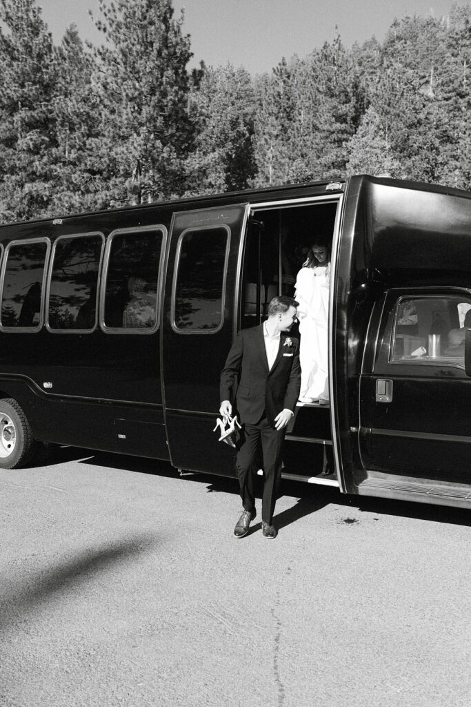 bride and groom riding to the party bus to the ceremony space. lake tahoe wedding elopement photographer videographer. 4JOY media