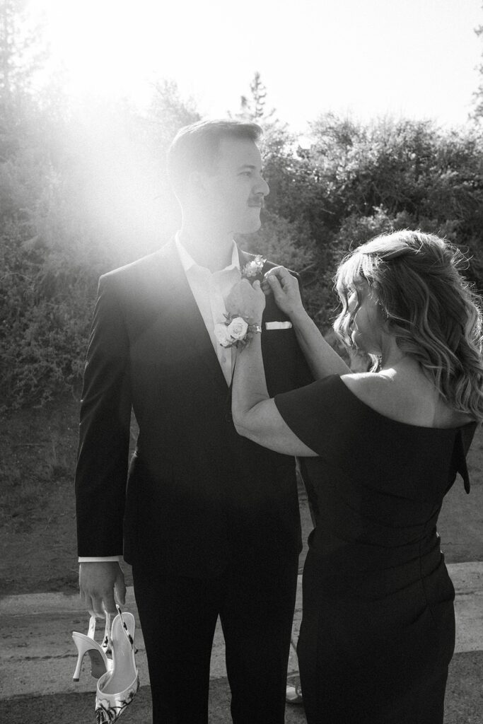 groom getting ready for ceremony. mom helping. lake tahoe wedding elopement photographer videographer. 4JOY media
