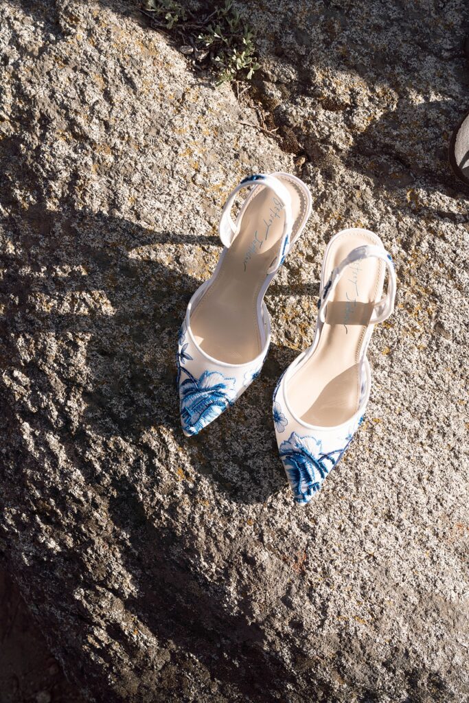 wedding shoes waiting on the rock during the ceremony. logan schoals elopement ceremony. lake tahoe wedding elopement photographer videographer. 4JOY media