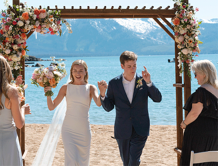 bride and groom wedding ceremony. Roundhill Beach Lake Tahoe Elopement Photographer Videographer 4JOY Media