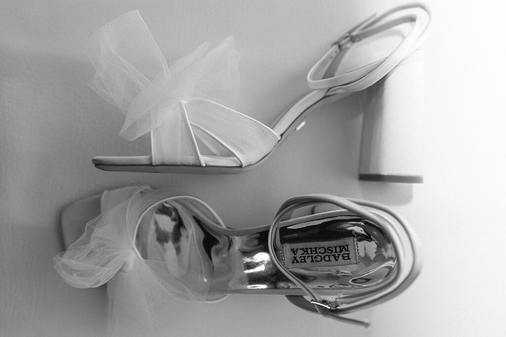 bride's shoes detail photo flat lay. Plumpjack inn Truckee Palisades Lake Tahoe Wedding photographer videographer