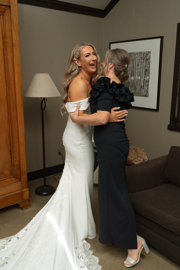 mom of the bride getting ready photos. Plumpjack inn Truckee Palisades Lake Tahoe Wedding photographer videographer