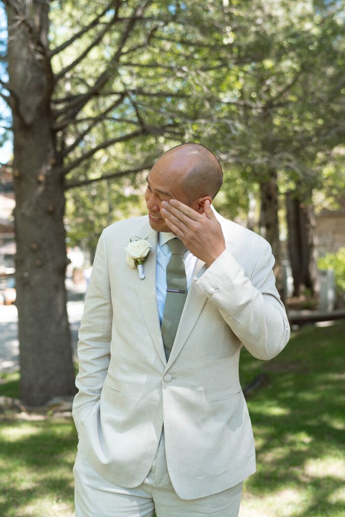 groom's reaction first look. Plumpjack inn Truckee Palisades Lake Tahoe Wedding photographer videographer