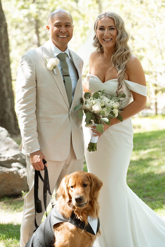 bride and groom wedding portrait with their dog. Plumpjack inn Truckee Palisades Lake Tahoe Wedding photographer videographer