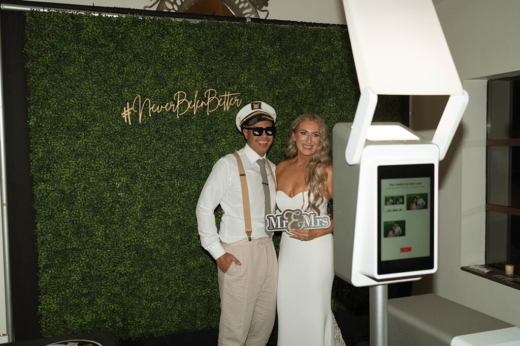 wedding reception photo booth with bride and groom.  Plumpjack inn Truckee Palisades Lake Tahoe Wedding photographer videographer