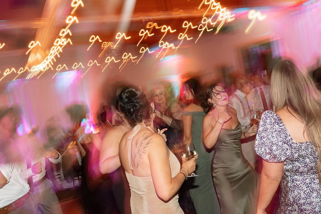 wedding reception dancing.  Plumpjack inn Truckee Palisades Lake Tahoe Wedding photographer videographer