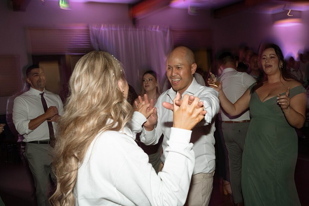 wedding reception dancing.  Plumpjack inn Truckee Palisades Lake Tahoe Wedding photographer videographer