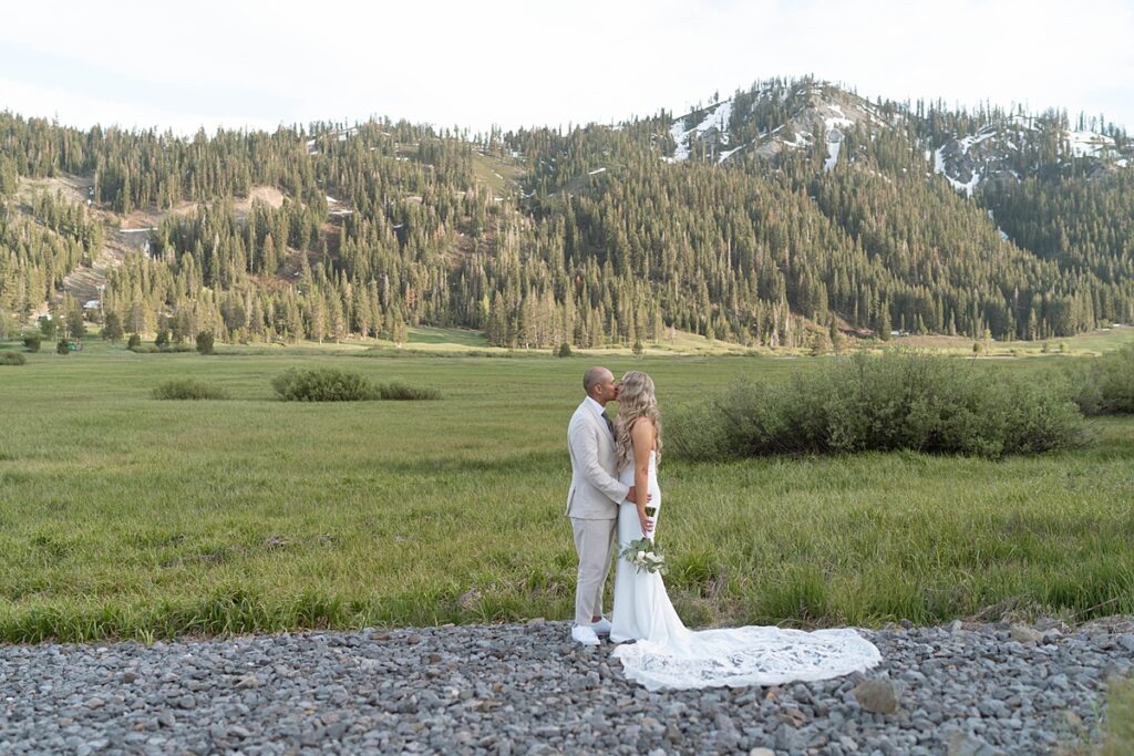 bride and groom portraits in the palisades meadow. Plumpjack inn Truckee Palisades Lake Tahoe Wedding photographer videographer
