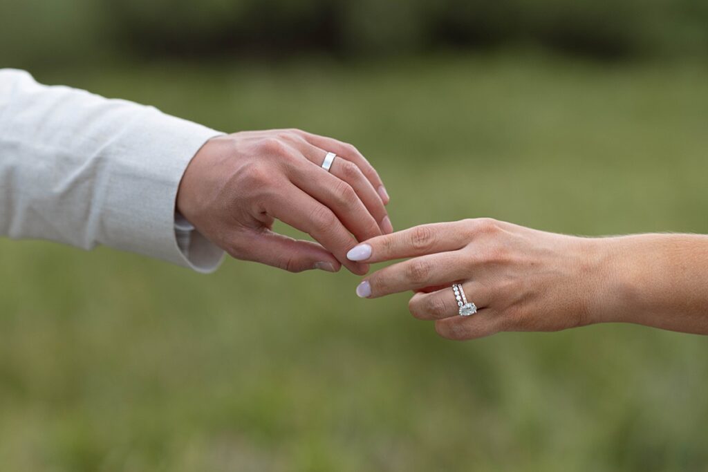 bride and groom portraits. ring photos. palisades meadows. Plumpjack inn Truckee Palisades Lake Tahoe Wedding photographer videographer