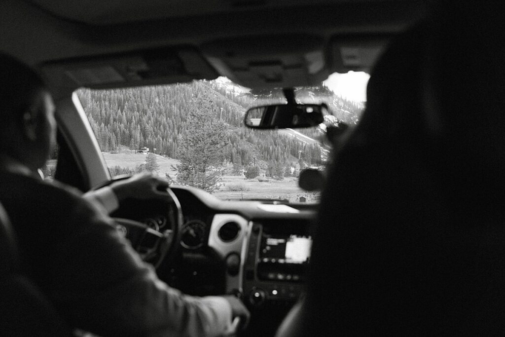 driving back to the venue from bride and groom portraits. palisades meadows. Plumpjack inn Truckee Palisades Lake Tahoe Wedding photographer videographer