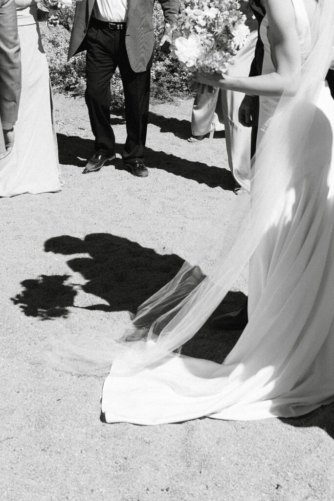 bride and groom creative photo Roundhill Beach Lake Tahoe Elopement Photographer Videographer 4JOY Media