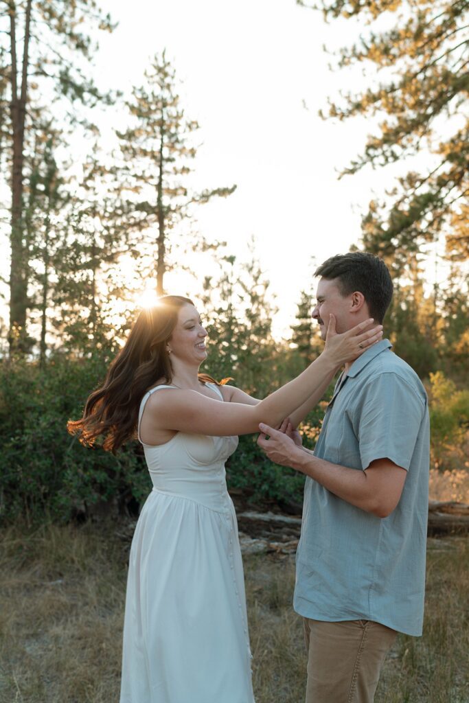 candid sweet embrace between an engaged couple during their lake tahoe adventure engagement session