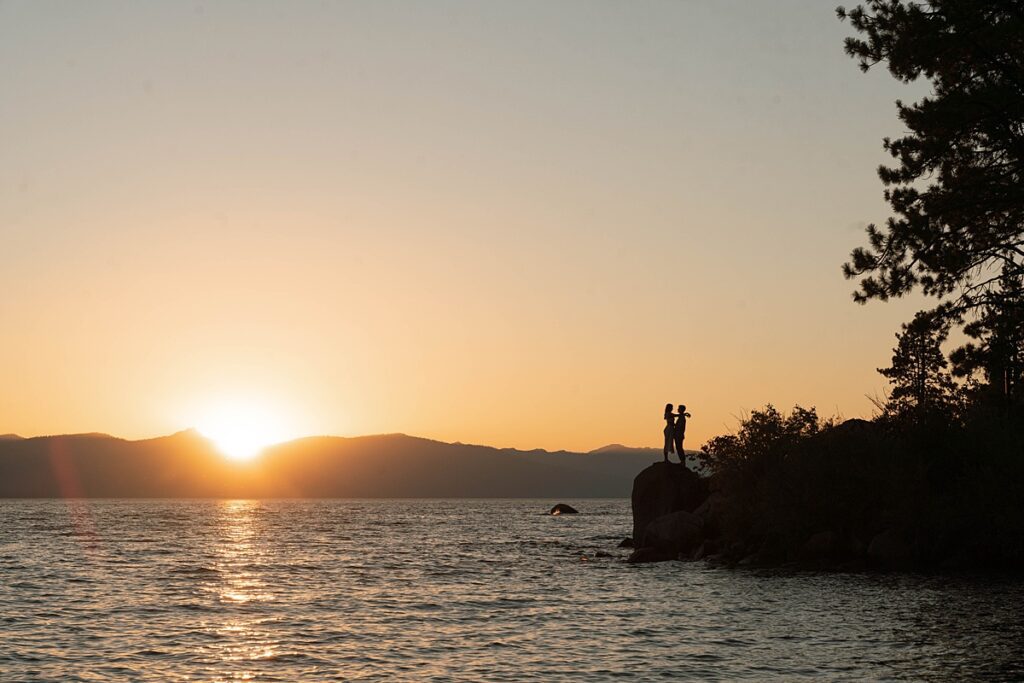 silhouette of an engaged couple captured during golden hour 