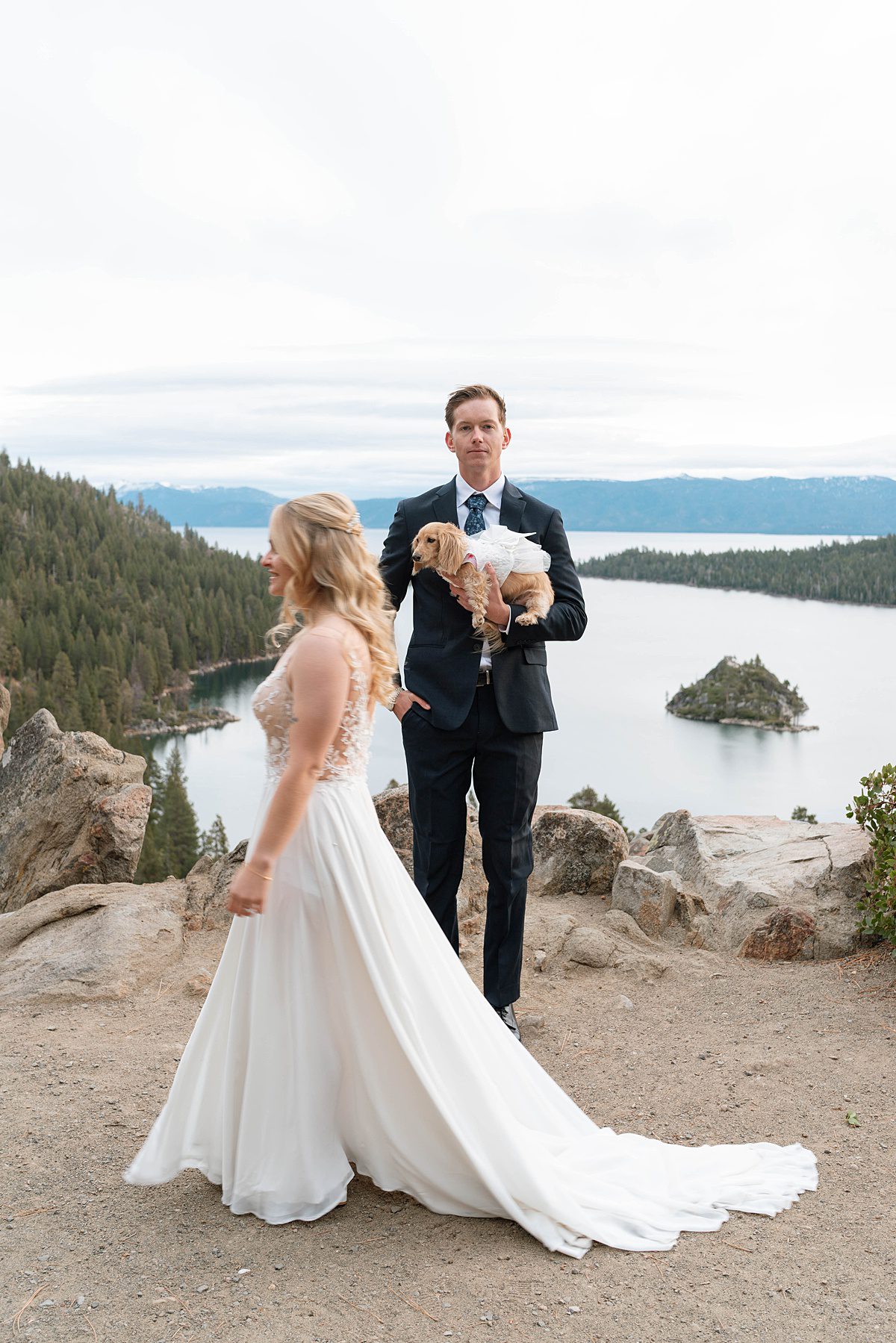 Couple's portrait overlooking Emerald Bay after their ceremony captured by Lake Tahoe Wedding Photographer